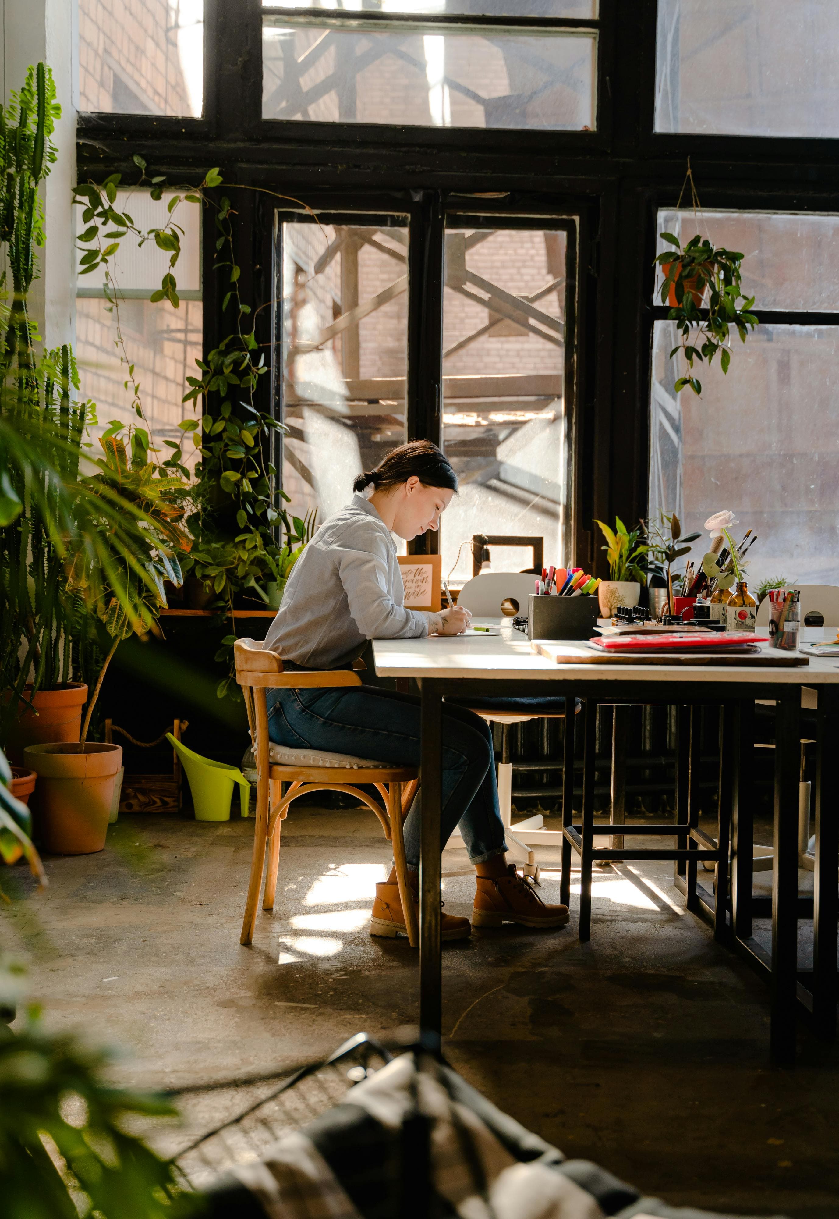 Cozy Workspace with Natural Light and Indoor Plants